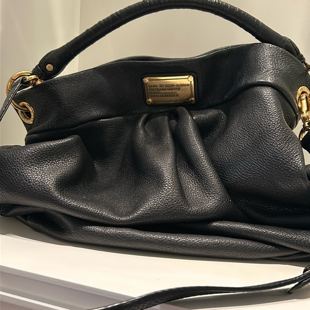 Marc Jacobs pebbled black leather hobo bag. Great condition. Sporty and roomy.